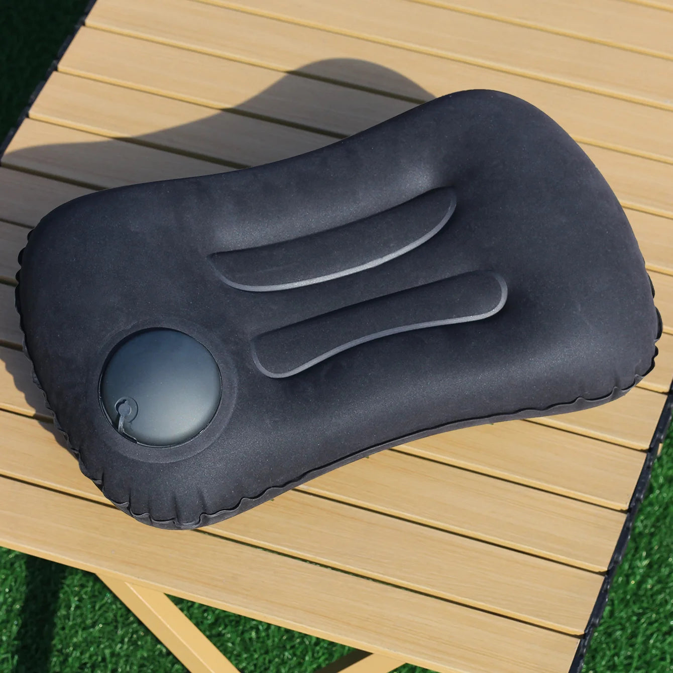 Automatic press - to - inflate pillow