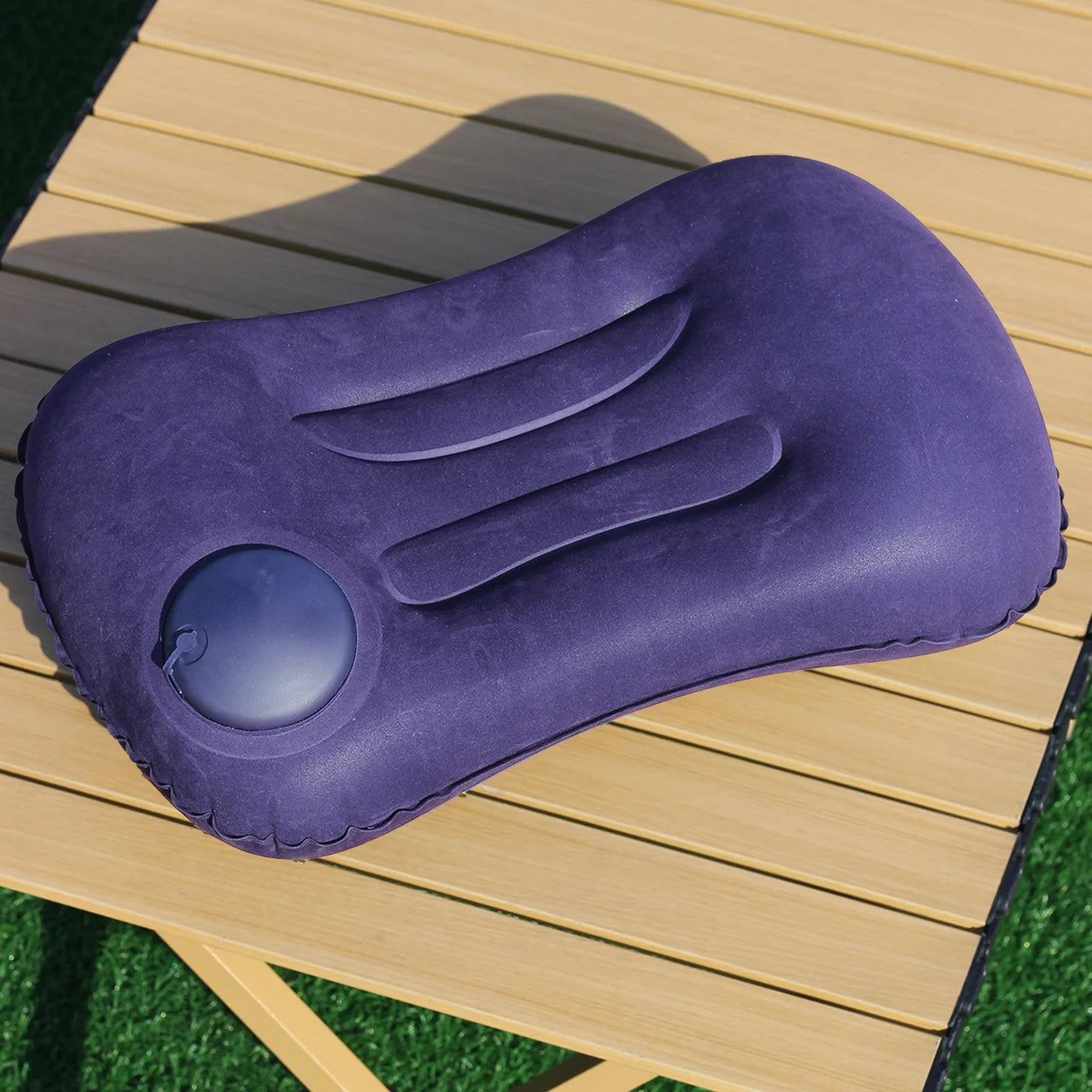 Automatic press - to - inflate pillow