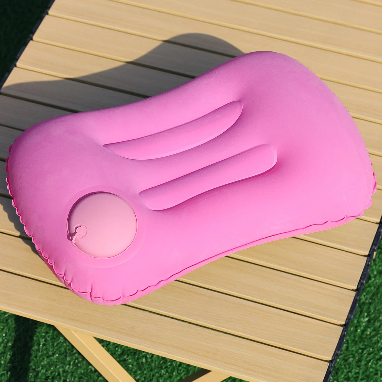 Automatic press - to - inflate pillow