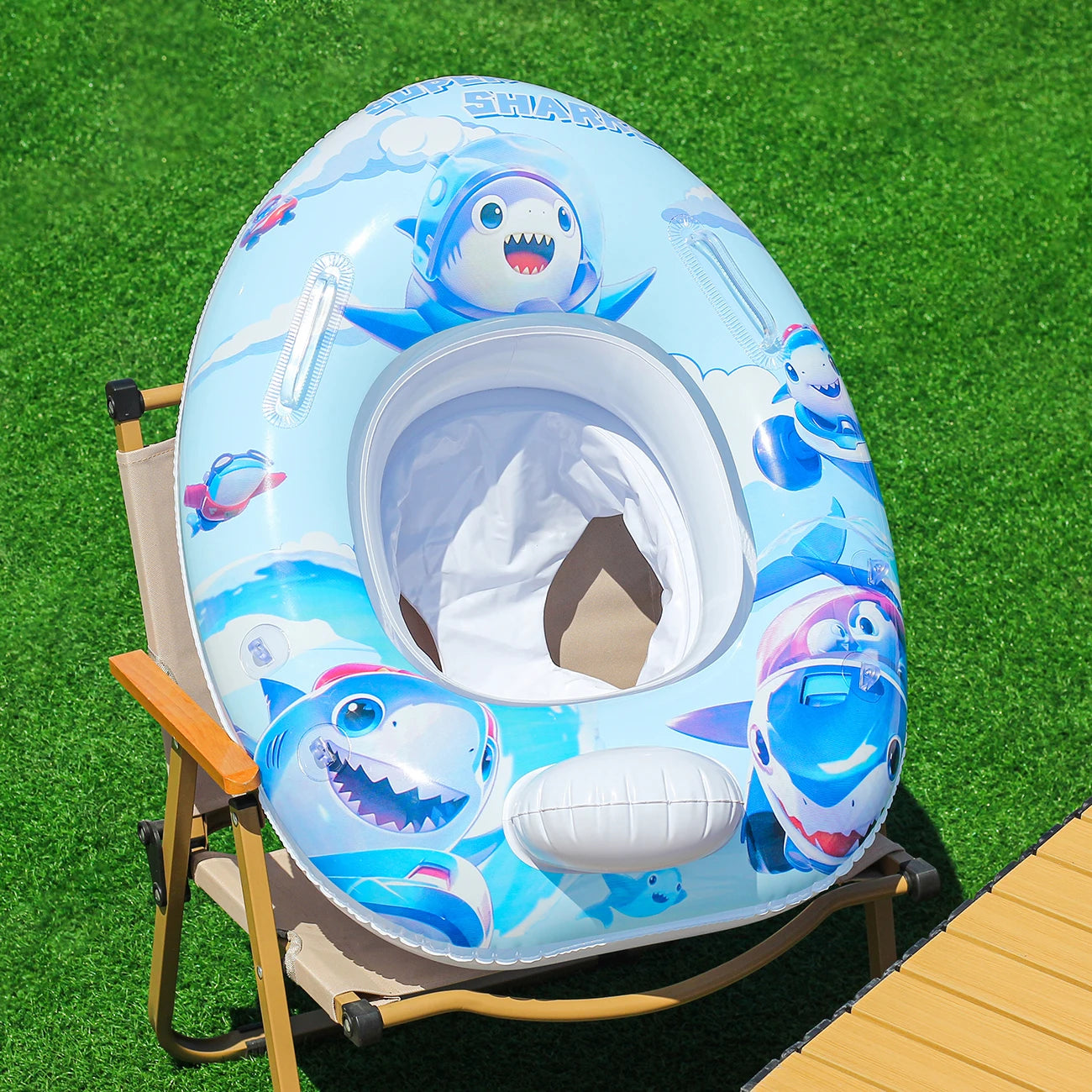 Booster swim float with seat and canopy and inflatable swim ring