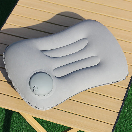 Automatic press - to - inflate pillow